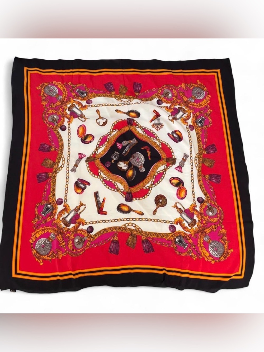Forele silk scarf with ornate gold and pink border featuring various makeup and